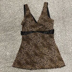 Adorable Leopard Print Flowy Shirt With Bow in the Back